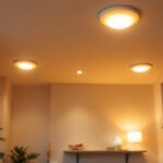 A photograph of a well-lit room showcasing 8-inch recessed lighting fixtures installed in a modern setting