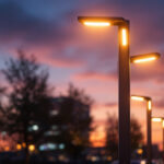 A photograph of a modern lighting installation featuring sleek