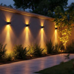 A photograph of a beautifully illuminated outdoor space featuring solar wall lighting