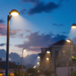 A photograph of a well-lit commercial outdoor space at dusk