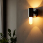A photograph of a beautifully designed wall sconce in a stylish interior setting