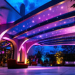 A photograph of a well-lit outdoor space featuring a modern led canopy installation