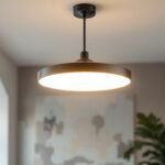 A photograph of a stylish pendant ceiling light installed in a modern interior setting