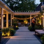A photograph of a beautifully illuminated outdoor space showcasing various types of outdoor lighting fixtures in use