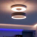 A photograph of a stylish 40-inch ceiling light fixture installed in a modern interior setting