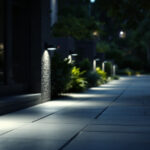 A photograph of a well-lit outdoor space showcasing motion-sensing lights in action