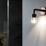 A photograph of a beautifully designed bath light fixture illuminating a modern bathroom setting