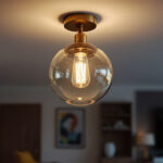 A photograph of a stylish semi-flush light fixture installed in a modern living space