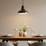 A photograph of a stylish dining light pendant hanging elegantly over a beautifully set dining table