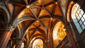 A photograph of a beautifully designed cathedral ceiling featuring stylish can lights