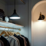 A photograph of a well-lit closet featuring stylish and functional light fixtures