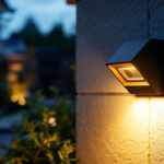 A photograph of a well-lit outdoor space featuring a stylish motion sensor light in action