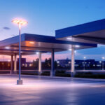 A photograph of a well-lit parking lot at dusk
