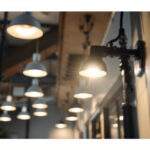 A photograph of a well-lit interior space showcasing various 2-inch can lights in action