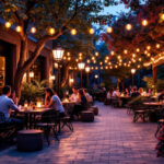 A photograph of a beautifully illuminated outdoor space featuring large outdoor lamps