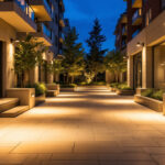 A photograph of a beautifully illuminated outdoor space featuring strategically placed lighting fixtures that enhance safety