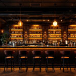 A photograph of a beautifully designed bar space featuring stylish over bar lighting fixtures that enhance the ambiance
