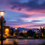 A photograph of a beautifully designed outdoor space illuminated by stylish solar panel lights at dusk