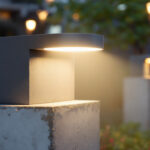 A photograph of a sturdy concrete post supporting a sleek
