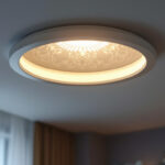 A photograph of a beautifully designed decorative recessed light cover installed in a stylish interior setting
