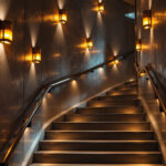A photograph of a beautifully lit stairway showcasing a variety of lighting options
