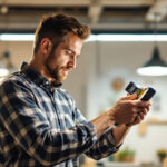 A photograph of a lighting contractor in action