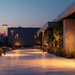 A photograph of a well-lit outdoor space featuring various styles of light post installations