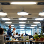 A photograph of a well-lit office space featuring modern led ceiling light fixtures