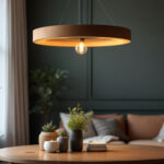 A photograph of a beautifully designed circular pendant light hanging in a stylish interior setting