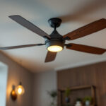 A photograph of a stylish industrial-looking ceiling fan installed in a modern space