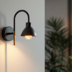 A photograph of a stylish gooseneck wall sconce installed in a modern interior setting