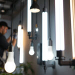 A photograph of a brightly lit room showcasing various long led light bulbs in stylish fixtures