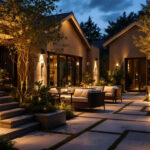 A photograph of a beautifully lit outdoor space showcasing a variety of stylish and functional outdoor lighting fixtures in use
