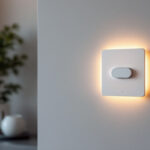 A photograph of a stylishly designed smart dimmer switch installed in a contemporary living space