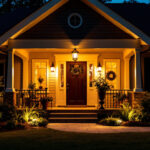A photograph of a beautifully illuminated front porch showcasing a variety of stylish outdoor lighting fixtures