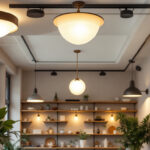 A photograph of a well-designed indoor space showcasing various ceiling light fixtures in use