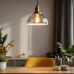 A photograph of a stylishly designed hanging pendant light in a well-decorated interior setting