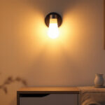 A photograph of a stylish wall lamp led light installed in a modern interior setting