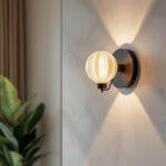 A photograph of a beautifully designed large wall sconce in a stylish interior setting