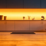 A photograph of a beautifully illuminated workspace or garage featuring under-cabinet led lights