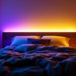 A photograph of a cozy bedroom setting featuring stylish bed led lights in various colors