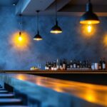 A photograph of a well-lit space showcasing various above bar lighting installations