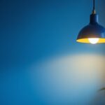 A photograph of a stylish hanging light pendant in a well-lit