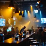A photograph of a bustling bar environment showcasing various lighting setups