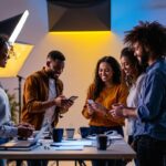 A photograph of a diverse group of team members engaged in a hands-on lighting training session