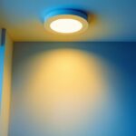 A photograph of a well-lit room featuring two recessed can lights