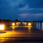 A photograph of a well-lit dock scene at dusk