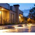 A photograph of a well-lit outdoor area showcasing various motion sensor lights in action