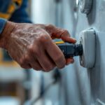 A photograph of a skilled lighting contractor expertly installing a waterproof plug in a residential or commercial setting