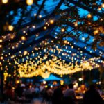 A photograph of a beautifully illuminated outdoor canopy adorned with string lights